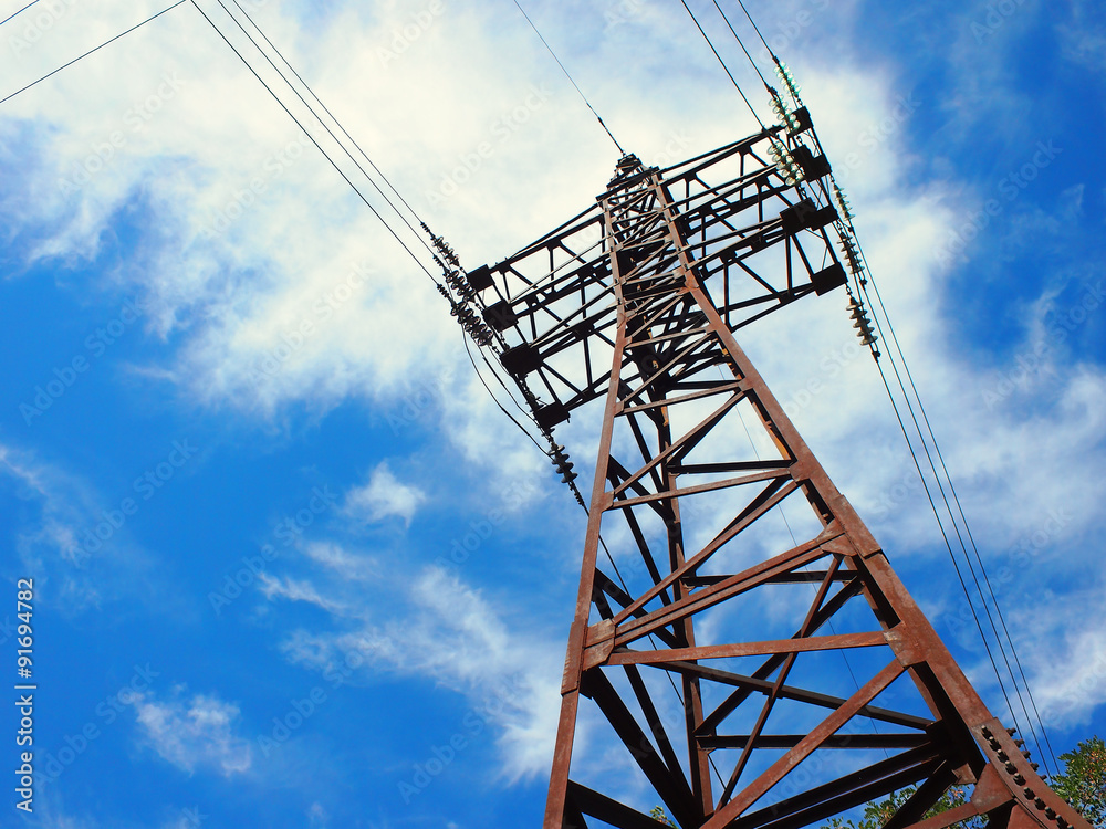 Upward view diagonally to the power line and pylon Upward view diagonally to the power line and pylon