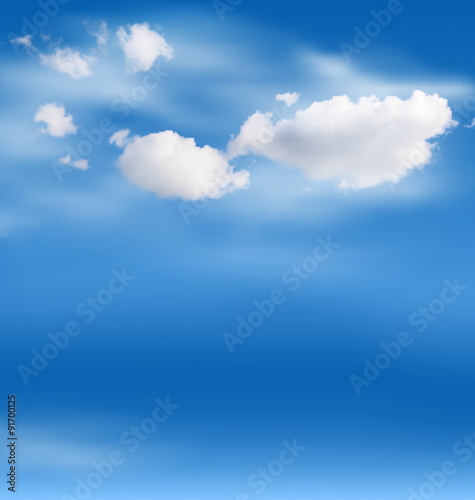 White clouds in the sky on blue background