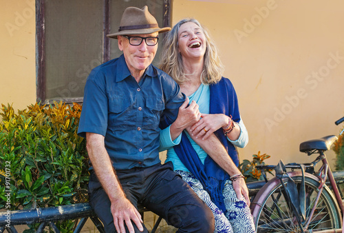 beautiful mature dutch couple outside of their house