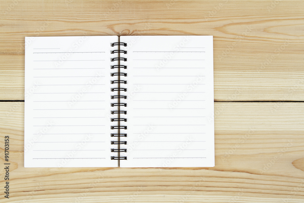 Notebook on wooden background. Notebook on wooden background.