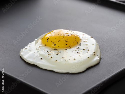 Cooking  fried eggs on electric barbecue