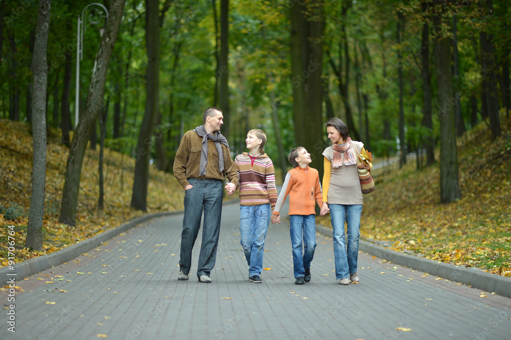 Family relaxing in autumn park Family relaxing in autumn park