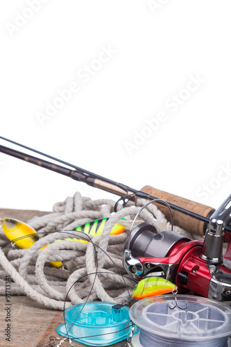 fishing tackles on board with white background