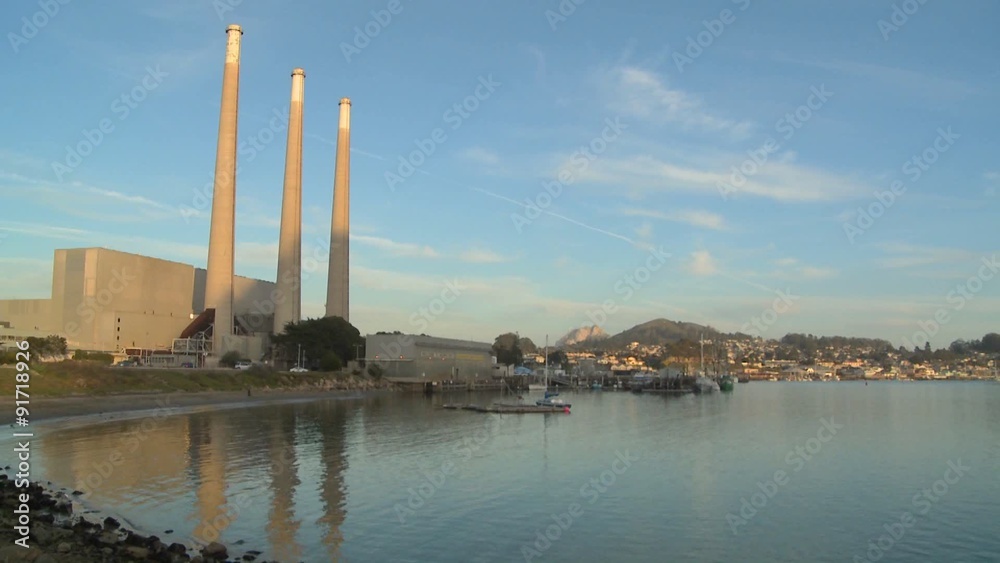A large power plant against the sky. A large power plant against the sky.