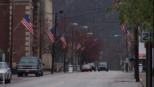 ZM out slowly telephoto shot of small town 