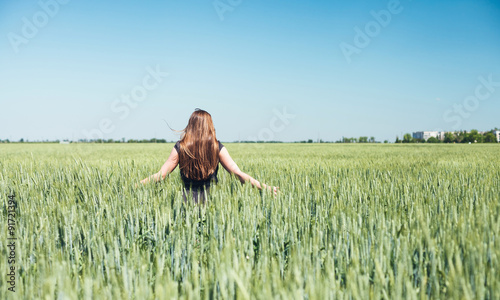 Girl in wheat