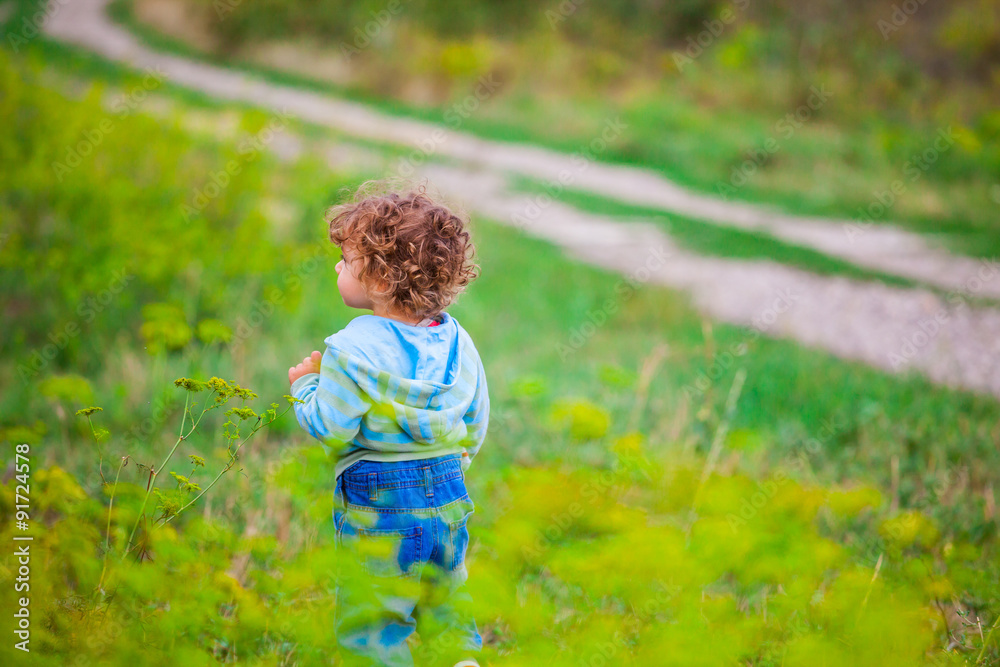 Baby boy outdoor in the countryside Baby boy outdoor in the countryside