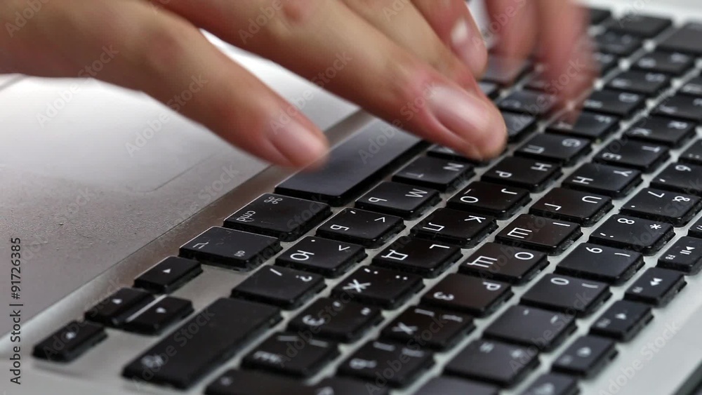 Fingers typing on a laptop Keyboard
Fingers typing on a laptop Keyboard