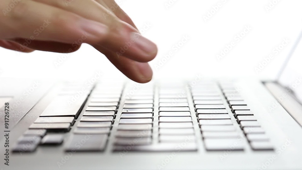 Fingers typing on a laptop Keyboard
Fingers typing on a laptop Keyboard