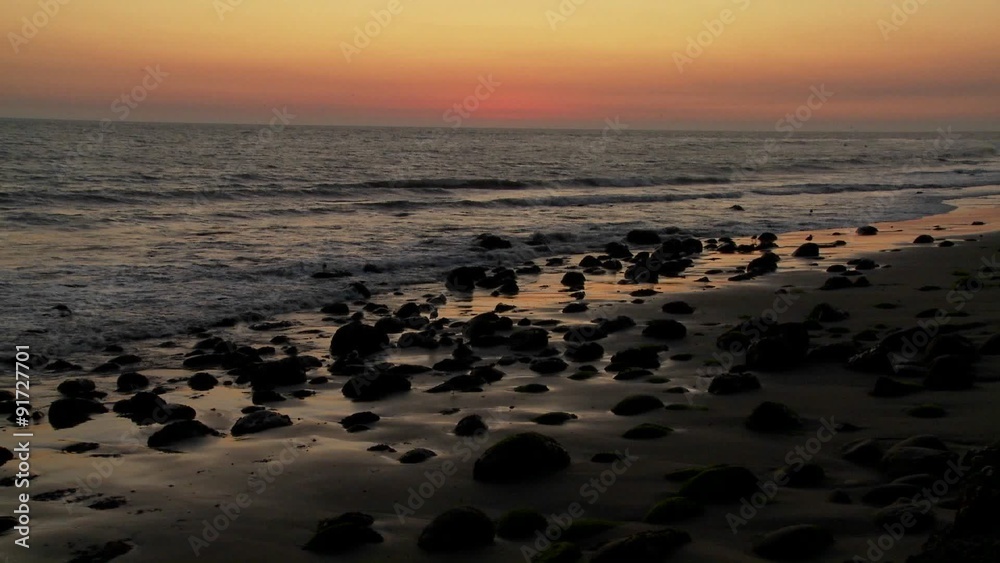 A beautiful sunset behind the California coastline. A beautiful sunset behind the California coastline.