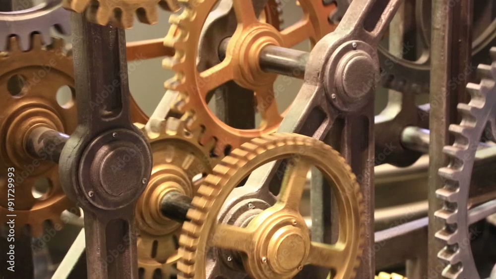 Moving gears of old mechanism close up Moving gears of old mechanism close up