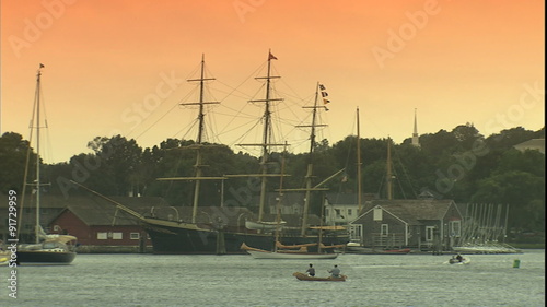 Mystic, CT. Harbor, pan to old sailing ships 