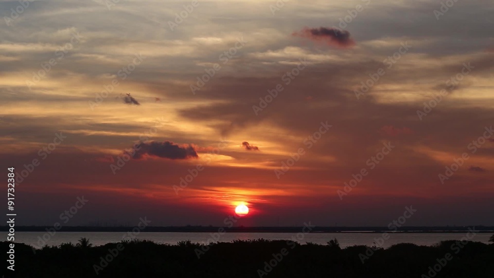 Beautiful sunset through clouds
