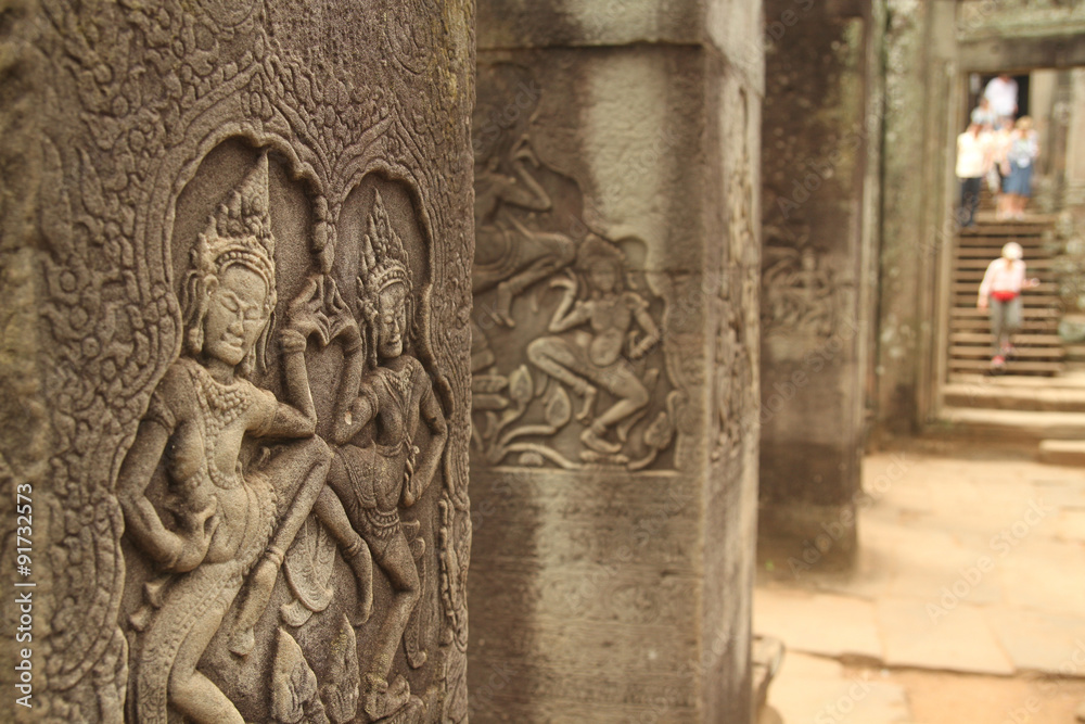 Dancing asparas on a column on the outer gallery at Angkor Thom in Siam Reap, Cambodia. 