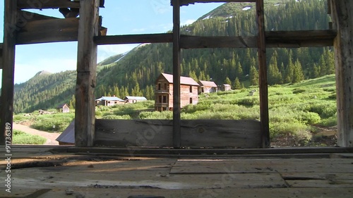 Colorado ghost town as seen through old windows. photo