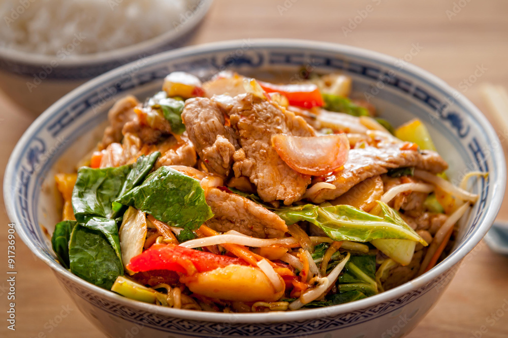 Stir fry pork with vegetables and chilli sauce.