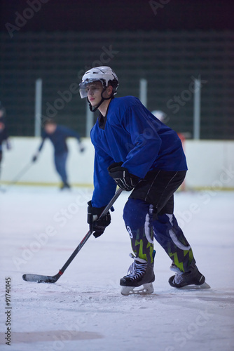 Photography ice hockey player in action