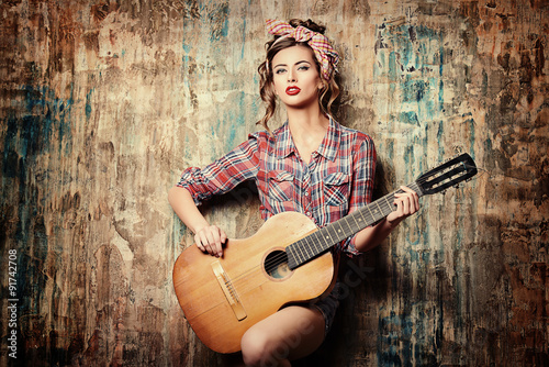 Canvas Print pin-up with guitar