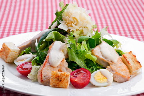 Warm salad with chicken meat