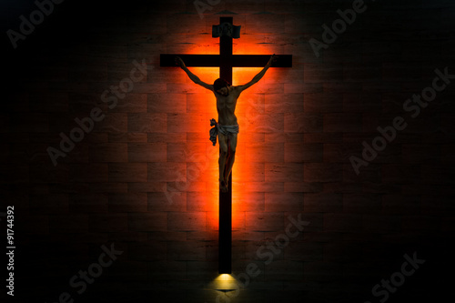 Crucifix of the Catholic Christian faith in silhouette.