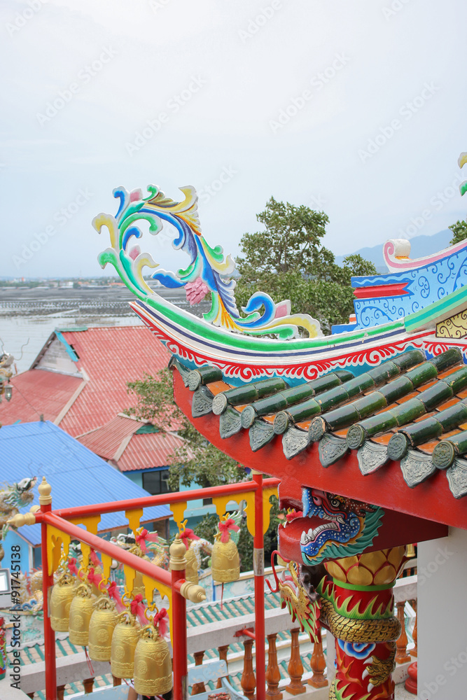Obraz premium chinese roof with gold bell