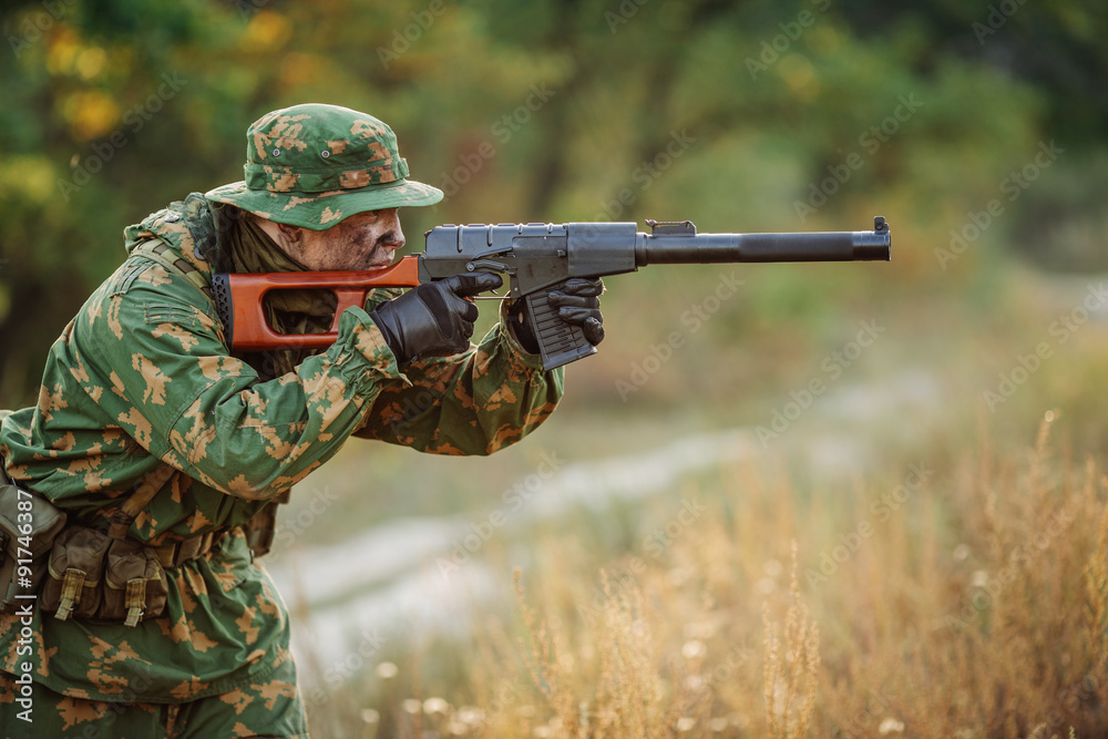 russian soldier in the battlefield with a rifle russian soldier in the battlefield with a rifle