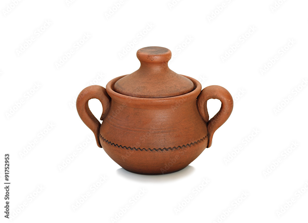 Clay pot with two handles and a lid isolated on white.