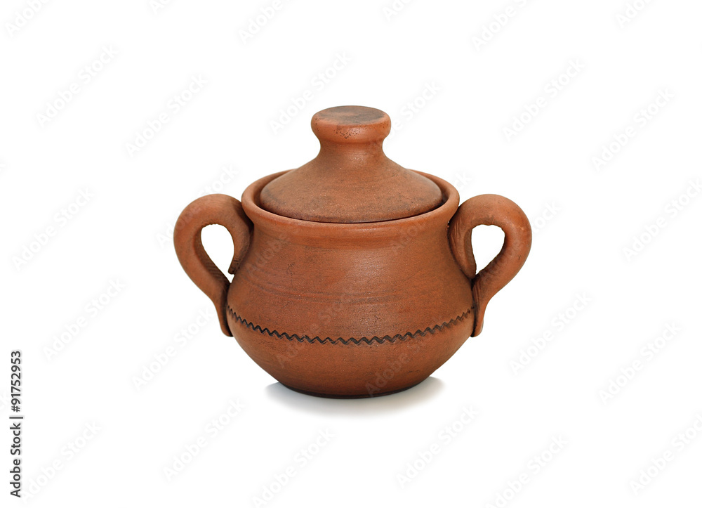 Clay pot with two handles and a lid isolated on white. Clay pot with two handles and a lid isolated on white.