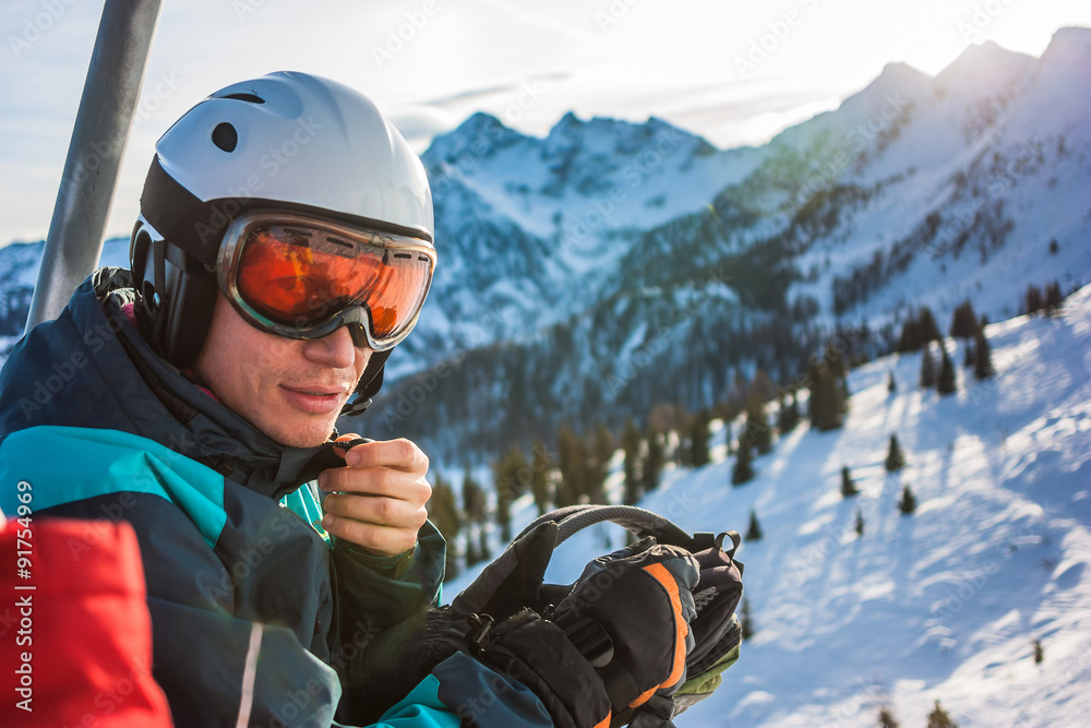Young skier at mountains ski resort in Austria