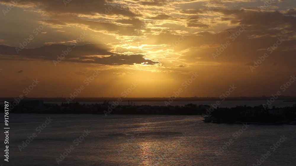 Beautiful yellow sunset with orange sky and clouds. Tropical sun down. Aerial view
Beautiful yellow sunset with orange sky and clouds. Tropical sun down. Aerial view
