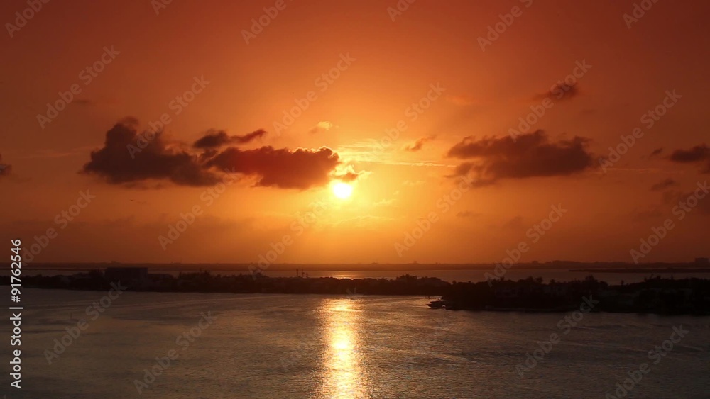 Beautiful yellow sunset with orange sky and clouds. Tropical sun down. Aerial view
Beautiful yellow sunset with orange sky and clouds. Tropical sun down. Aerial view