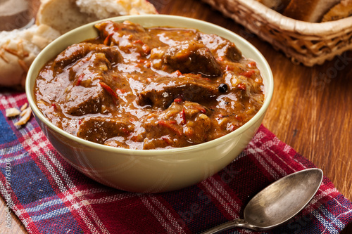 Beef stew served with crusty bread