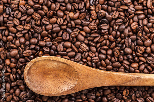 coffee beans and wooden spoon