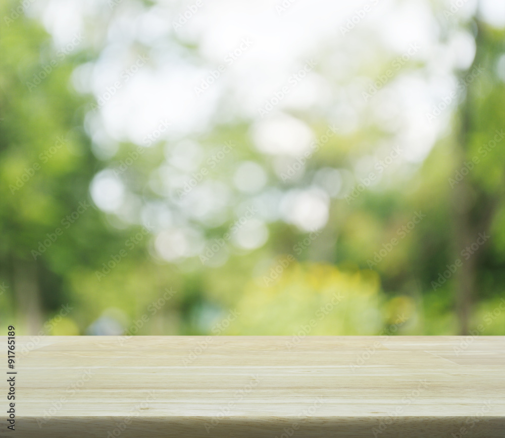 Empty table and blurred tree bokeh background for your product d Empty table and blurred tree bokeh background for your product d