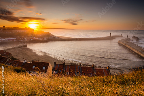Whitby Harbour at sunset photo