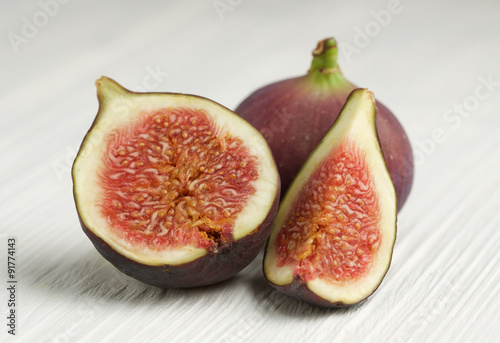 figs on white wooden background
