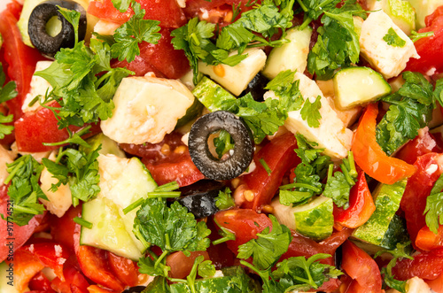 Fresh salad with tomatoes, cucumber and cheese cubes