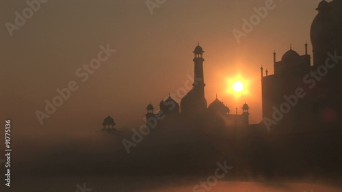 CU sunrise mosque & minaret of Taj Mahal photo