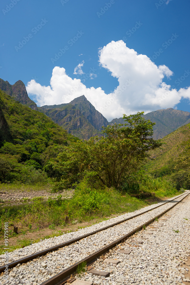 Railway track and Machu Picchu mountains, Peru