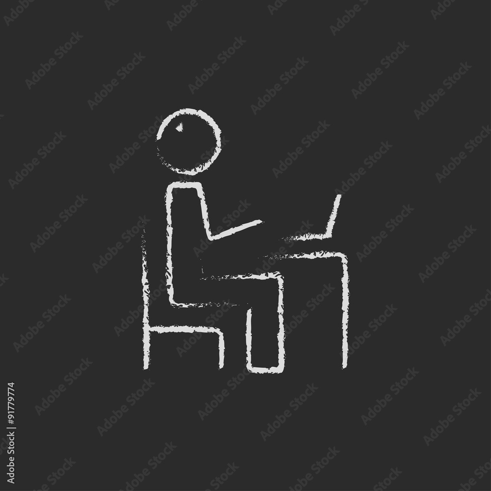 Businessman working at his laptop icon drawn in chalk.