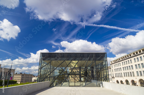 Glass entrance into the Square Brussels Meeting Centre in the historical Kunstberg or Mont des Arts area photo