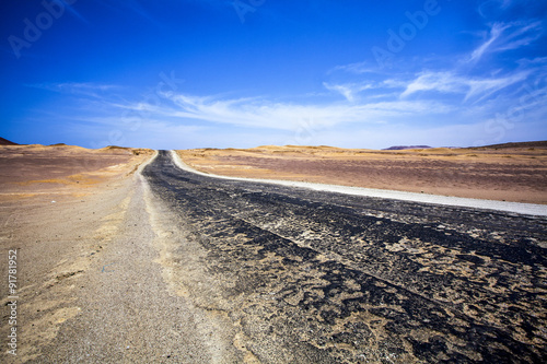 Road for the salt transportation through the desert of the Reserva Nacional de Paracas, Ica, Peru - South America