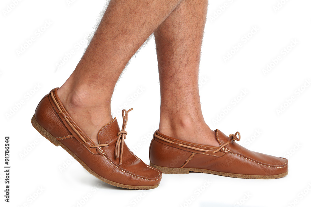 Fashion leather and brown moccasins shoes on white background