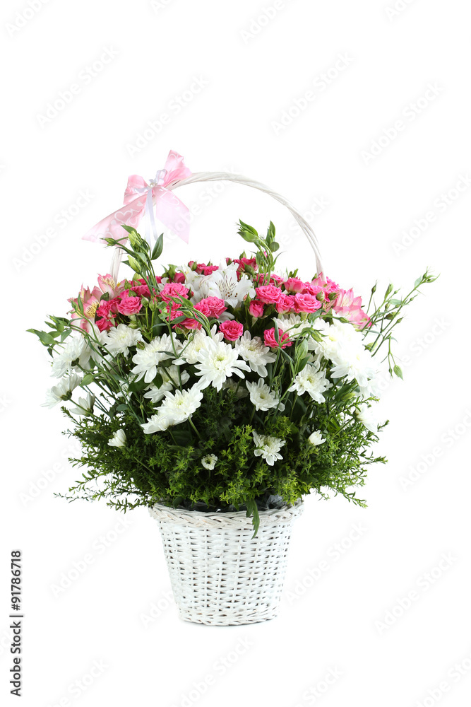 Bouquet of pink roses in basket isolated on a white