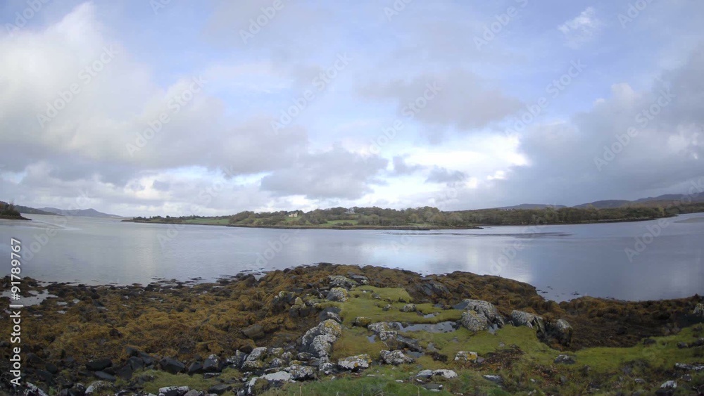 Time lapse of clouds blowing over the water at Doe Castle near Creeslough in County Donegal, Ireland. Time lapse of clouds blowing over the water at Doe Castle near Creeslough in County Donegal, Ireland.
