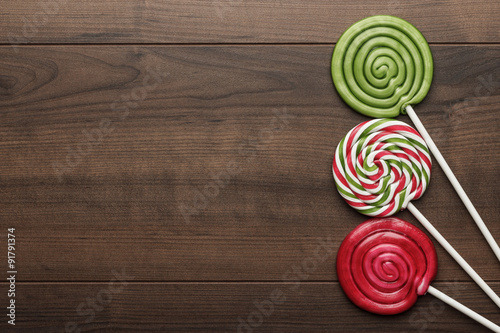 three colorful lollipops