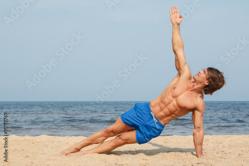 Man during workout on the beach