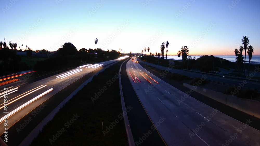 Wide angle Time lapse zooming in of morning rush hour traffic on the Ventura Freeway on Highway 101 through Ventura, California. Wide angle Time lapse zooming in of morning rush hour traffic on the Ventura Freeway on Highway 101 through Ventura, California.