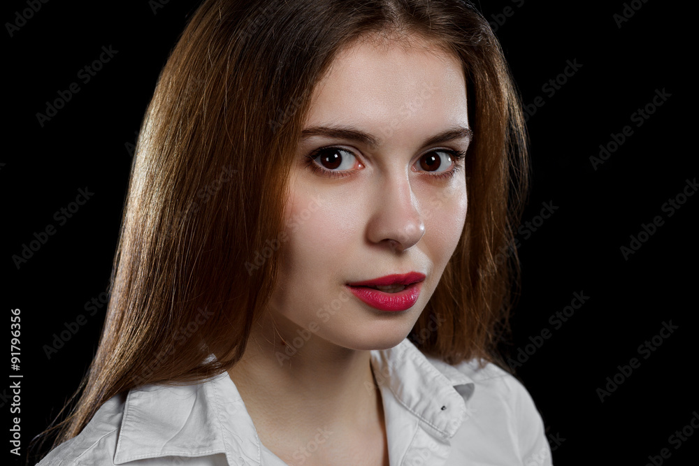 Young casual woman isolated over black background Young casual woman isolated over black background