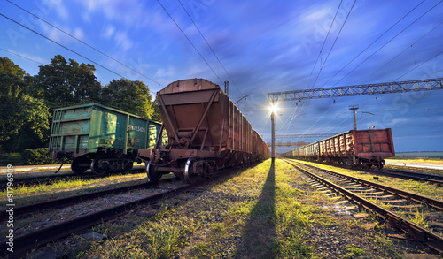 Cargo train platform at night. Railroad in Ukraine. Railway 